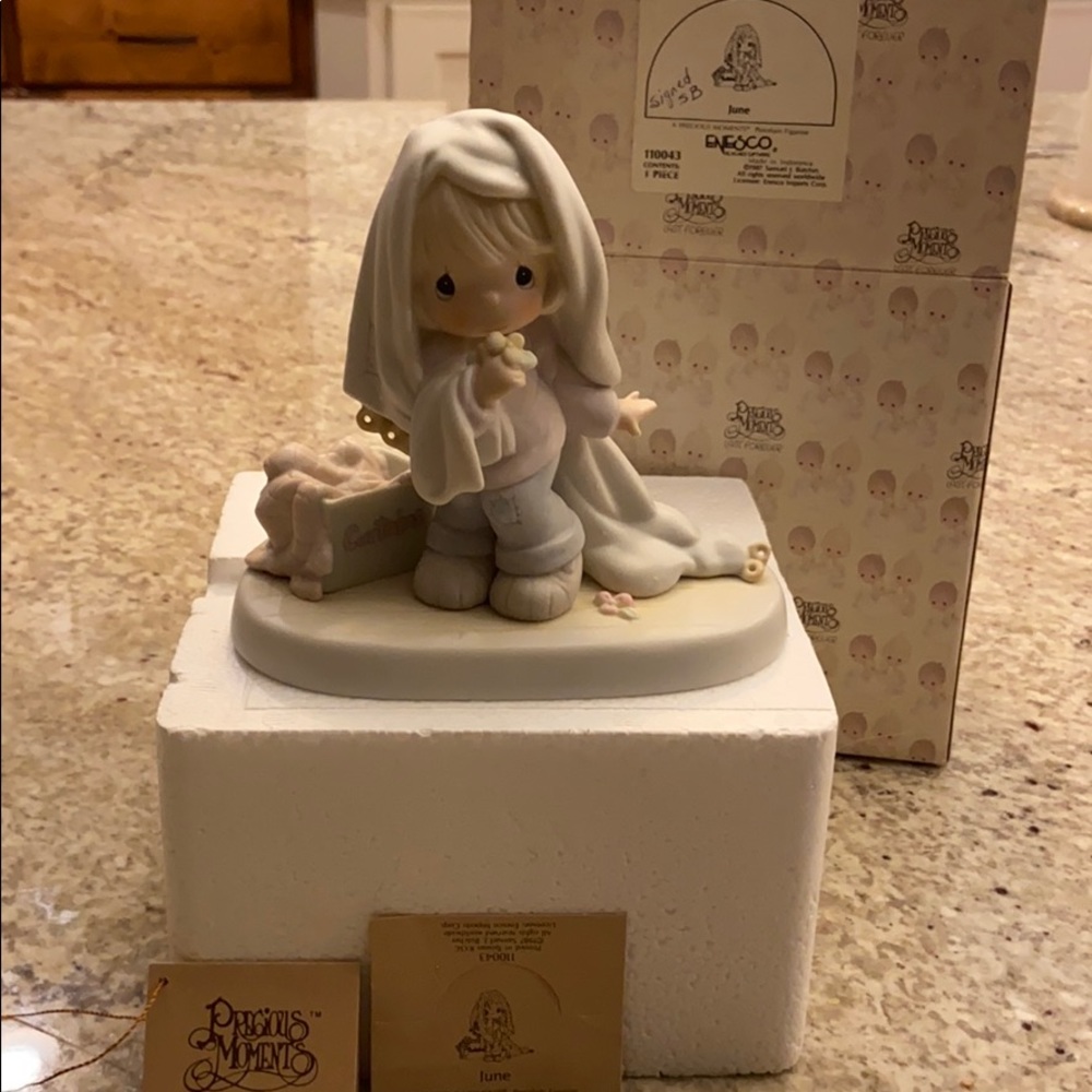 Precious Moments June figurine